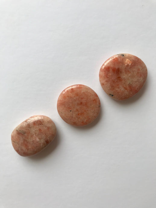 Sunstone palm stones